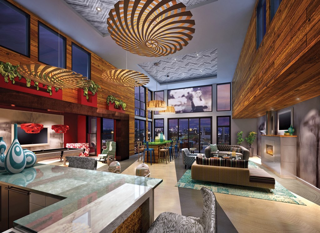 a rendering of a living room with a kitchen and a large window a rendering of a living room with a kitchen and a large window at Ann Arbor City Club, Michigan